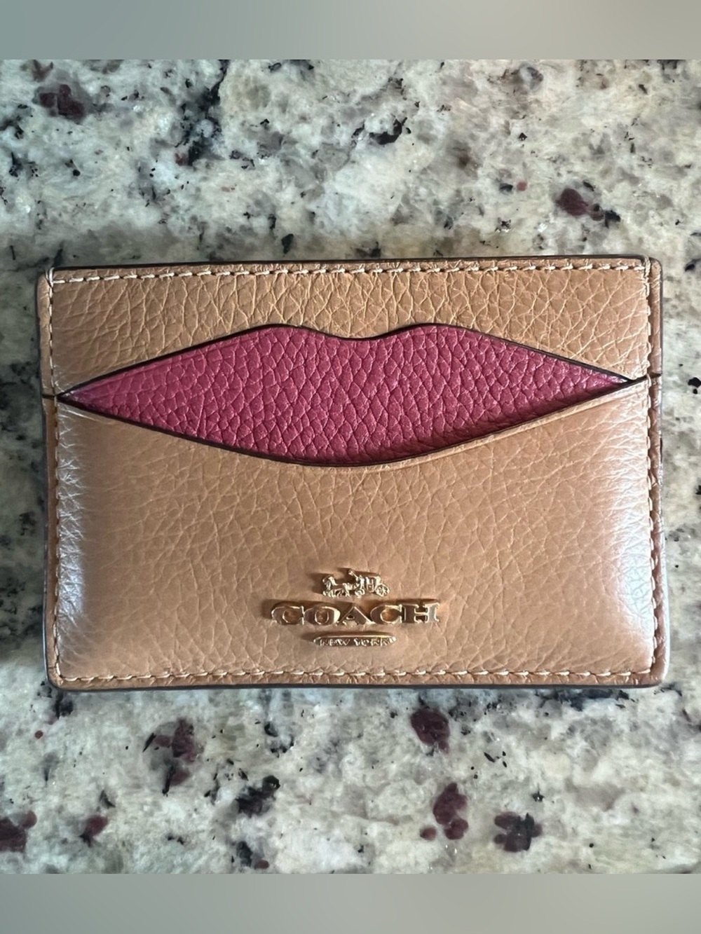 Coach authentic Lips card case 
Gold Leather Card Case with Pink Accent